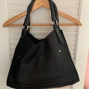 Cole Haan beautiful black leather  pebble finished purse 2 braided handles..